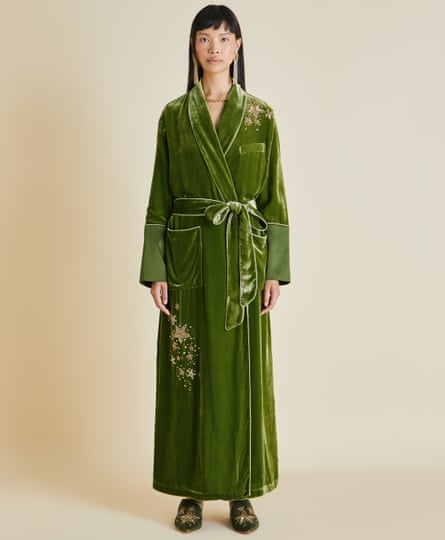 Green velvet robe by Olivia von Halle.
