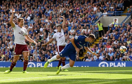 Alvaro Morata dives to head the ball into the back of the net.
