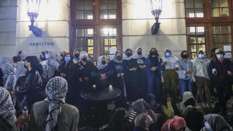 Pro-Palestine protesters barricade Columbia University building – video