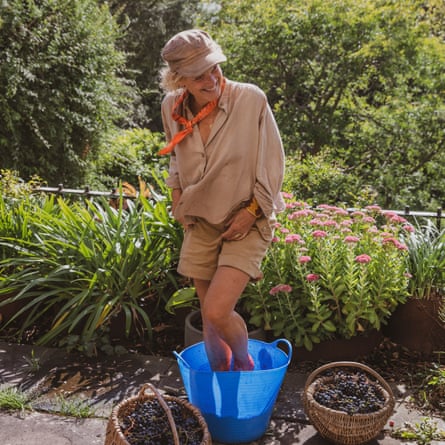Jo Scofield treads her grapes.