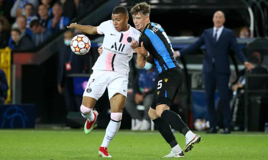 Jack Hendry tangles with Kylian Mbappé in the Champions League in September