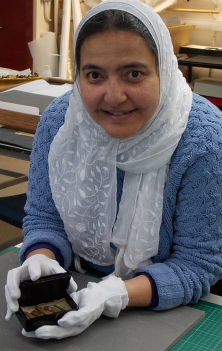 Curatorial assistant Abeer Eladany, who herself is from Egypt, with a cigar box she found at the University of Aberdeen which contained fragments of cedar wood recovered from inside the pyramid at Giza.