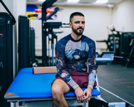 Vladislav sitting in a gym.