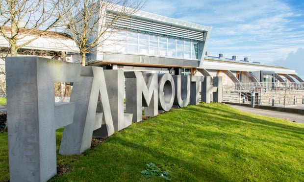 BUildings and sign at the Falmouth Penryn Campus.