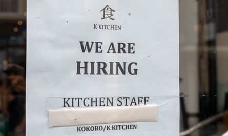 A hiring notice in a restaurant window in Windsor, Berkshire, UK.