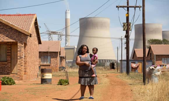 Nkosinathi Mkhwanazi and daughter Joy at Kayalethu settlement near a US-funded power station in Mpumalanga province, South Africa.