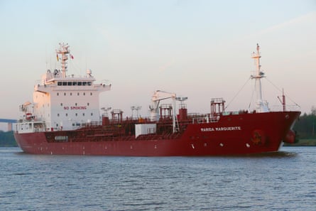 The Marida Marguerite, a red and white tanker, at anchor