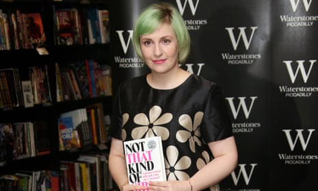 Lena Dunham, pictured holding her memoir Not That Kind Of Girl, published by Random House.