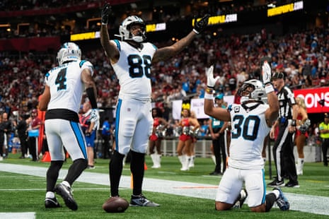 Panthers running back Chuba Hubbard celebrates.