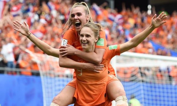 Vivianne Miedema celebrates her second goal with teammate Jill Roord.