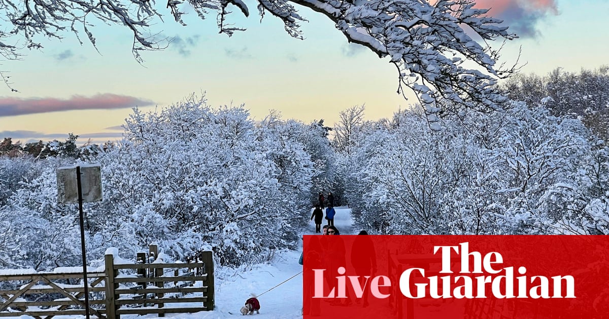 UK weather warnings remain in place as UK hit by snow and freezing rain - live updates