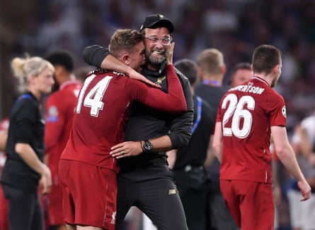 Jürgen Klopp embraces Jordan Henderson after winning the Champions League in 2019