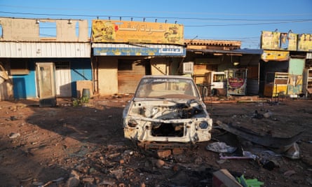 Wrecked cars in Khartoum, at the frontline of clashes between the Rapid Support Forces (RSF) and Sudanese army