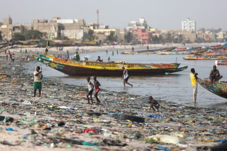 A view of plastic waste and debris covering a beach