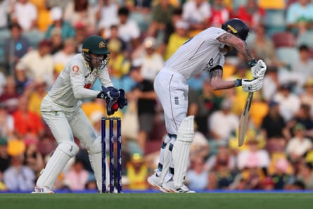 Carey takes the crucial catch to dismiss Ben Stokes.