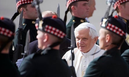 Pope Benedict XVI inspects a guard of honour at Edinburgh airport as he arrives for a four-day state visit to Britain in September 2010.