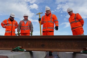 Boris Johnson with rail workers at the Network Rail hub at Gascoigne Wood, near Selby, North Yorkshire.
