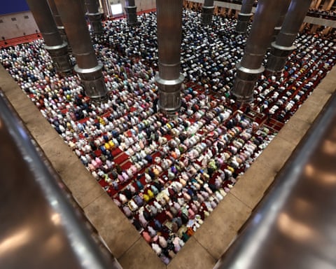 Muslims offering tarawih on the first night of Ramadan at the Grand mosque of Istiqlal in Jakarta, Indonesia.