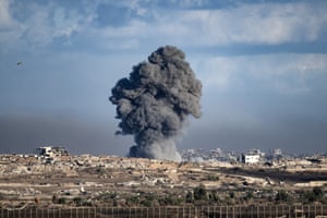 A plume of dark smoke rising from the horizon