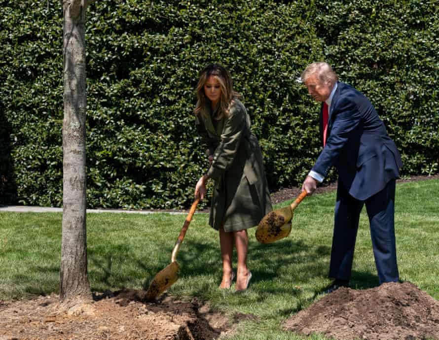 Donald and Melania Trump plant a tree on the south lawn of the White House in honour of Earth Day and Arbor Day, 22 April 2020