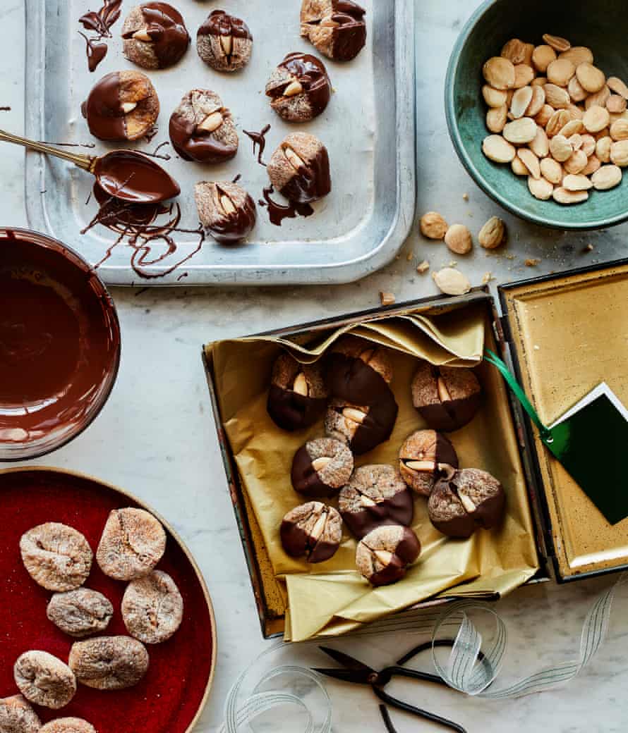 Rachel Roddy’s dried figs stuffed with almonds dipped in chocolate.