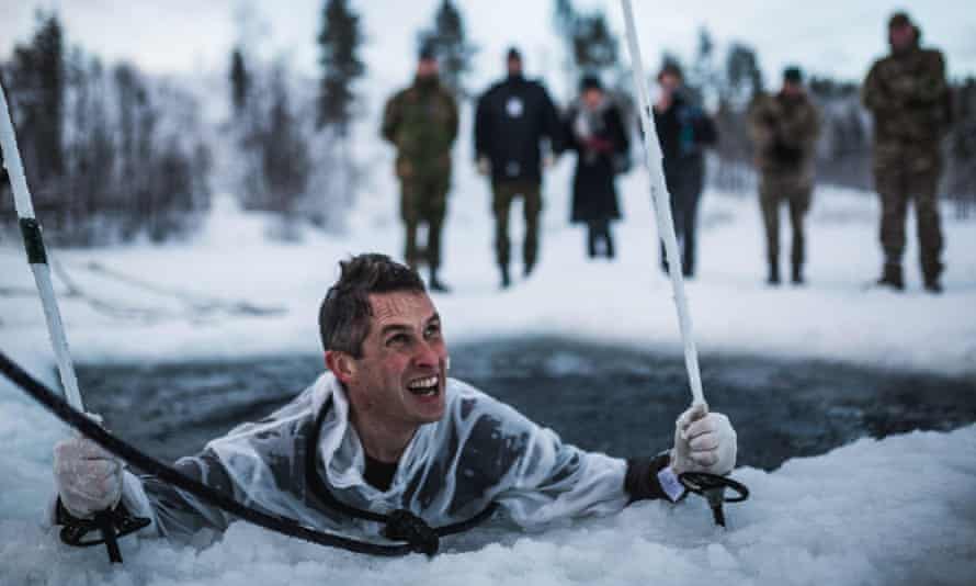 Gavin Williamson during ice breaking drills with the Royal Marines in Norway.