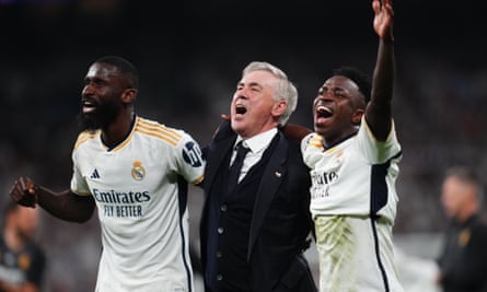 Antonio Rüdiger, Carlo Ancelotti and Vinícius Junior celebrate victory against Bayern Munich