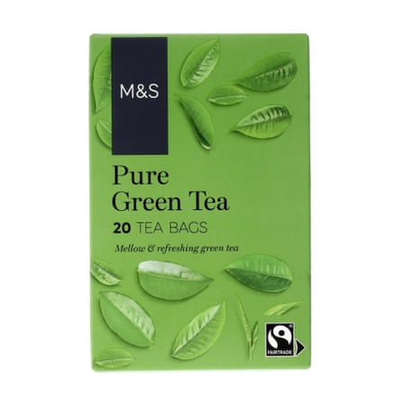 A green box of M&S Pure Green teabags features leaf illustrations and a Fairtrade logo