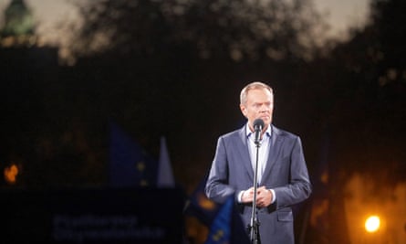Donald Tusk on stage to address protesters in Warsaw