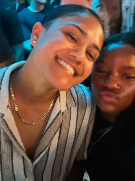 two women smile