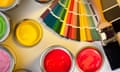 Paint tester pots, colour charts and a paintbrush
