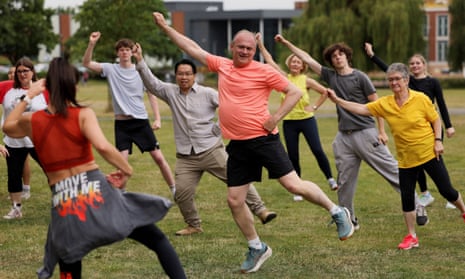 British leader of the Liberal Democrats party Ed Davey participates in a Zumba class with supporters during a Liberal Democrats general election campaign event in Wokingham, Britain, 1 July 2024.