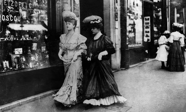 Two elegant ladies walking in the street  in Paris 1905
