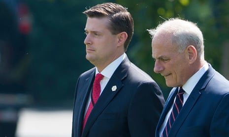 (FILES) White House Chief of Staff John Kelly (R) and White House Staff Secretary Rob Porter (L)walk to Marine One prior to departure from the South Lawn of the White House in Washington, DC, August 4, 2017. Close Trump aide Rob Porter stepped down from his post as staff secretary on February 07, despite his denial of grim accusations of abuse by his two ex-wives. It has since emerged that Porter did not receive full security clearance because of the allegations, but nevertheless worked at the president’s side day in and day out, handling highly classified material. / AFP PHOTO / SAUL LOEBSAUL LOEB/AFP/Getty Images