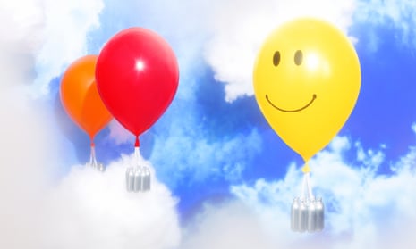 Composite of balloons (one with a smily face) carrying laughing gas canisters against clouds and blue sky