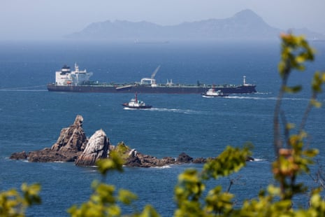 Tugboats guide the crude oil tanker Odessa, carrying UAE crude after passing through the strait of Hormuz this May.