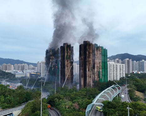 Aerial photograph shows smoke rise from the buildings