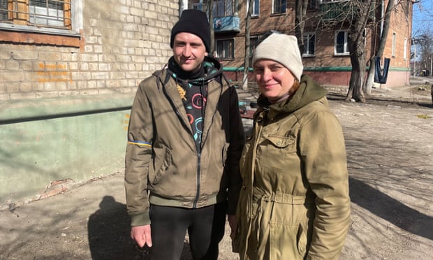 Stanislav Manilov and Tetiana Medveyeva, part of a group of volunteers handing out food to Kharkiv's residents