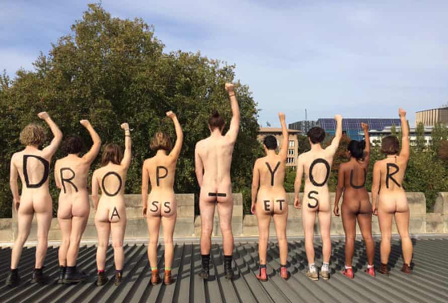 Nine students from Melbourne University stood on the roof of the campus’ Old Quad building and stripped off to reveal the message “drop your assets” painted on their bare backs and bottoms. The group protested the university’s investment in the fossil fuel industry.