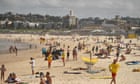Bondi beach closed down after crowds defy ban on gatherings of more than 500 people