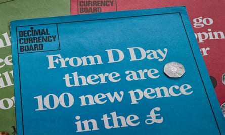 Leaflets produced by the Decimal Currency Board on decimalisation alongside a 50p coin issued by the Royal Mint for the 50th anniversary of Decimal Day