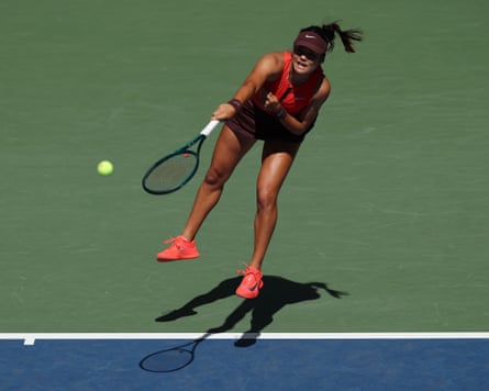 Emma Raducanu serves against Janice Tjen