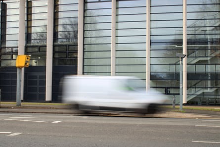 White Van driving past a speed camera