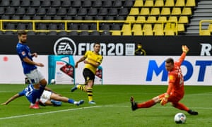Raphaël Guerreiro strikes just before half-time to put Dortmund 2-0 ahead.