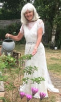 Catherine O’Nolan does a spot of gardening in her wedding dress.