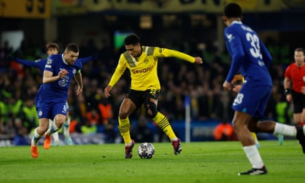 Jude Bellingham (centre) goes up against Mateo Kovacic in midfield.