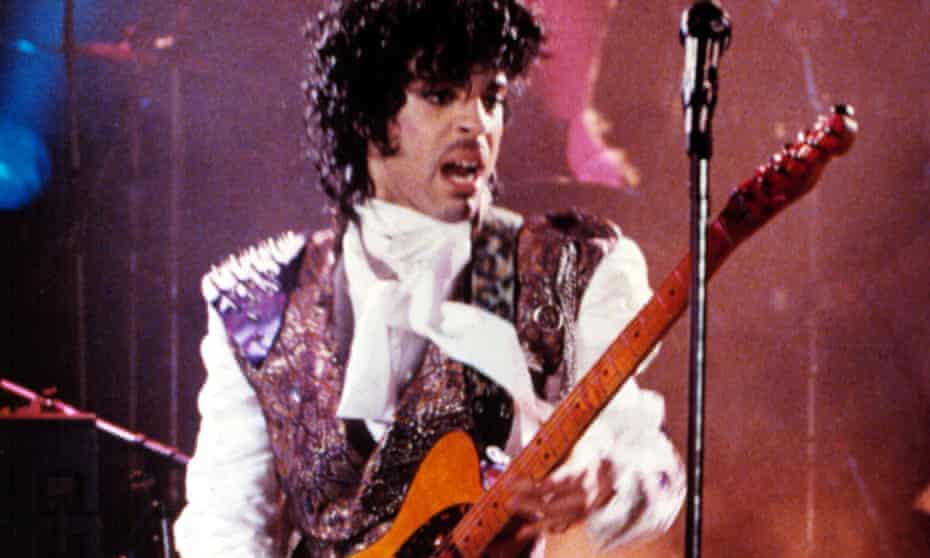 A shirt worn by Prince in the film Purple Rain has fetched nearly $100,000 at auction.