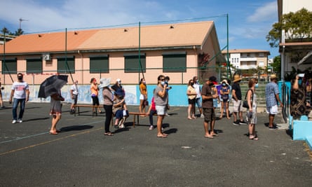 People queue in Noumea to vote in New Caledonia’s third referendum in 2021.