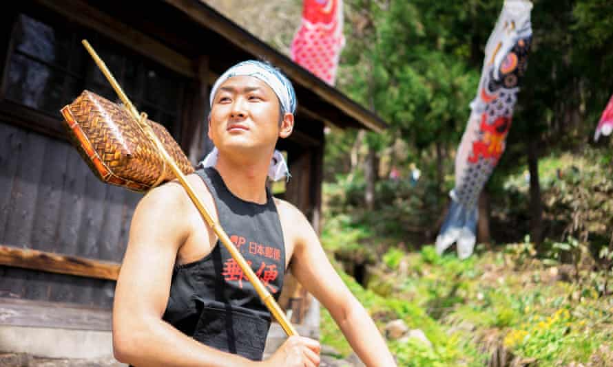 Seigo Fujiwara, a Japan Post deliveryman, from the Otari village annual calendar in Otari, Nagano Prefecture, Japan.
