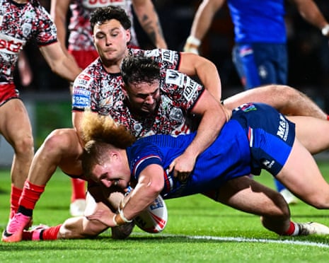 Caius Faatili scores a try for Wakefield against Leigh Leopards.